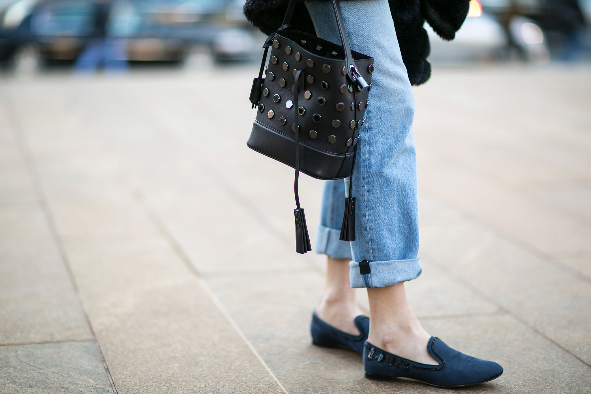Chiara Ferragni's studded bag and navy loafers did their part to dress up her denim. 
