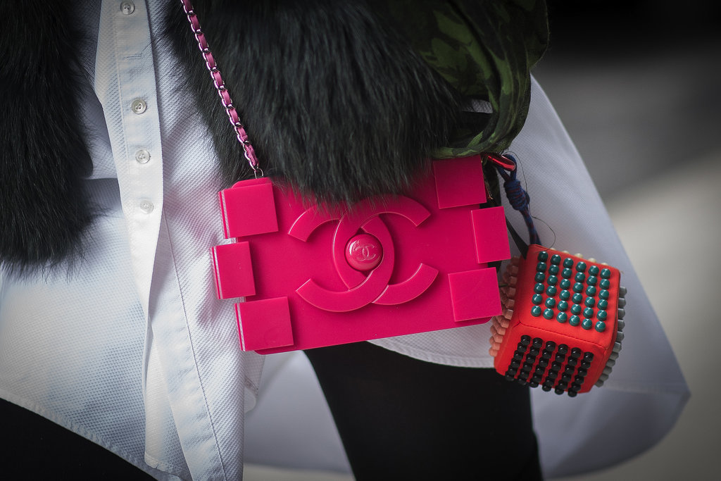 It may be small, but this little Chanel clutch packs a punch with its notice-me hue.
It may be small, but this little Chanel clutch packs a punch with its notice-me hue.