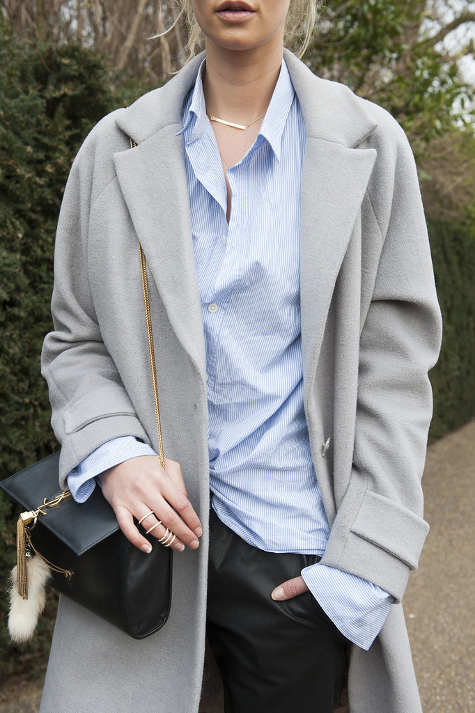 She scores points with a luxe YSL bag and a gorgeous display of rings.
She scores points with a luxe YSL bag and a gorgeous display of rings.