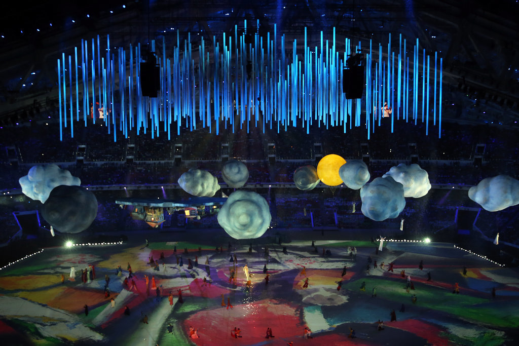 Glowing clouds and a bright yellow sun were suspended in the air.
