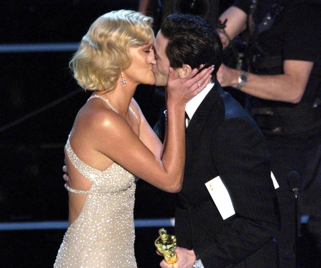 Charlize Theron planted a big kiss on Adrien Brody at the 2004 show.
Charlize Theron planted a big kiss on Adrien Brody at the 2004 show.