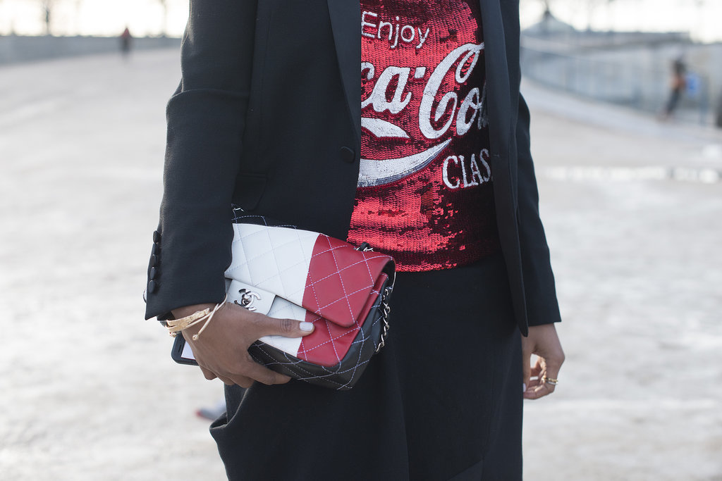 Shiona Turini capitalized on her red and black palette with a coordinating Chanel bag.
Shiona Turini capitalized on her red and black palette with a coordinating Chanel bag.