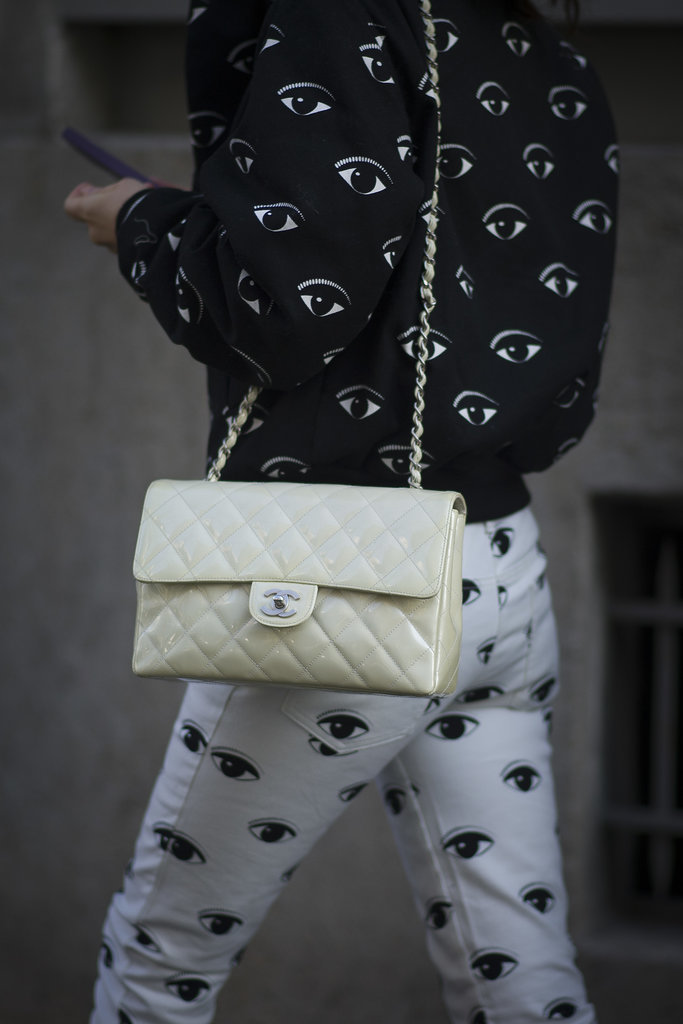 She finished off her bold Kenzo prints with a pastel Chanel.
She finished off her bold Kenzo prints with a pastel Chanel.