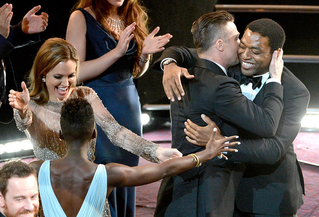 Angelina Jolie, Brad Pitt, Lupita Nyong'o, and Chiwetel Ejiofor couldn't contain their excitement when 12 Years a Slave won best picture at the Oscars.
Angelina Jolie, Brad Pitt, Lupita Nyong'o, and Chiwetel Ejiofor couldn't contain their excitement when 12 Years a Slave won best picture at the Oscars.