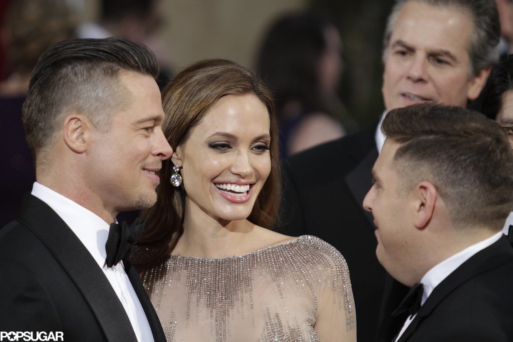 Brad Pitt and Angelina Jolie stopped to chat with Jonah Hill on the red carpet.
Brad Pitt and Angelina Jolie stopped to chat with Jonah Hill on the red carpet.