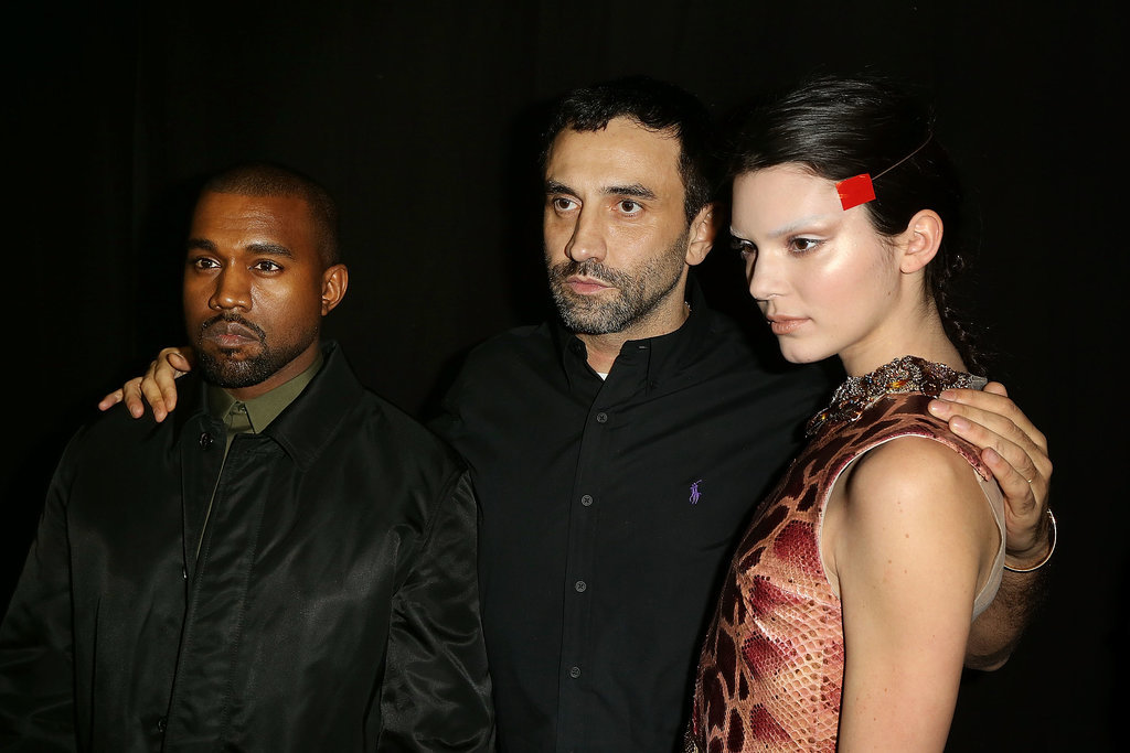 Kendall posed with her future brother-in-law Kanye West and designer Riccardo Tisci after walking the Givenchy show. 

