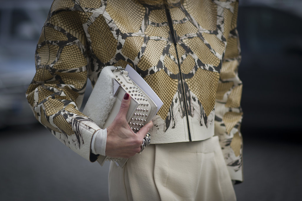 She piled on the texture with a furry finish on her bag and an exotic finish on that jacket.
She piled on the texture with a furry finish on her bag and an exotic finish on that jacket.