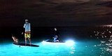 Get Your Glow On With Nighttime Stand-Up Paddleboarding Get Your Glow On With Nighttime Stand-Up Paddleboarding