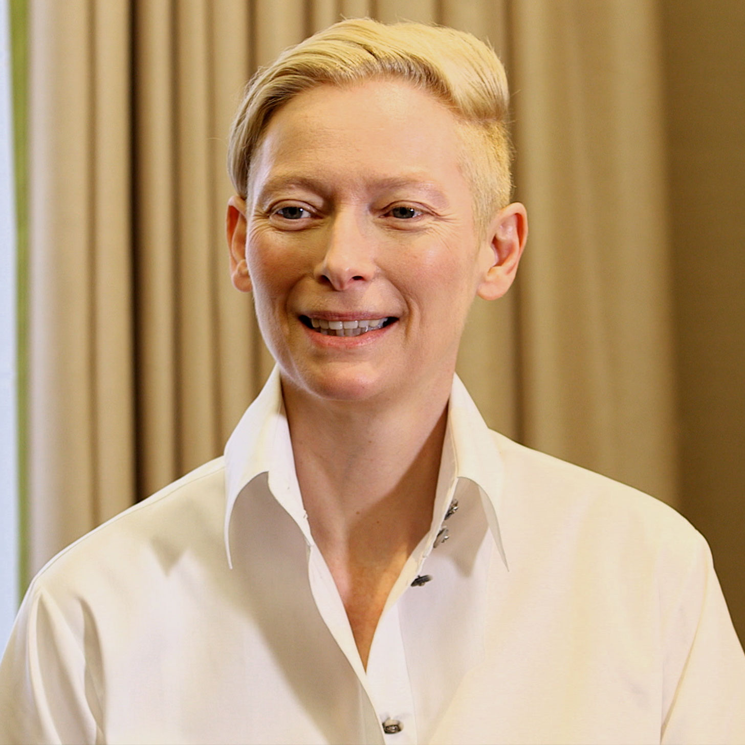 Tilda Swinton Says She Forced Tom Hiddleston Not to Smile