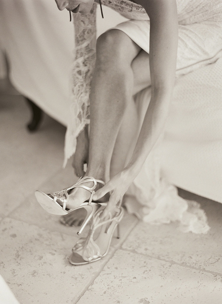 15. Bride Putting On Shoes 15. Bride Putting On Shoes
