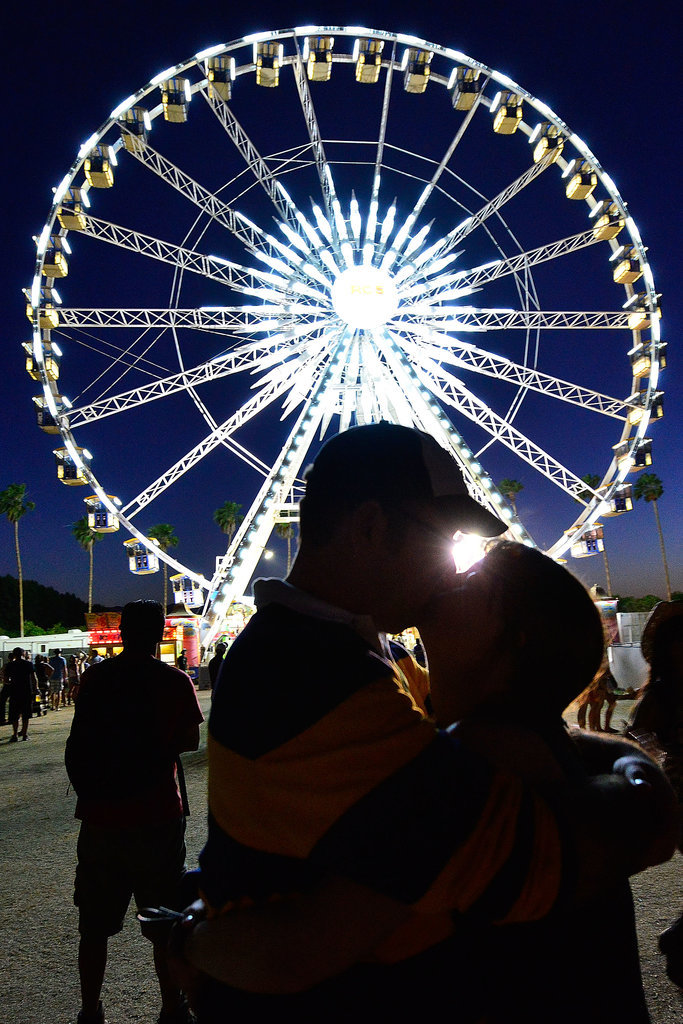 A couple got kissy in front of the ferris wheel at Stagecoach.
A couple got kissy in front of the ferris wheel at Stagecoach.
