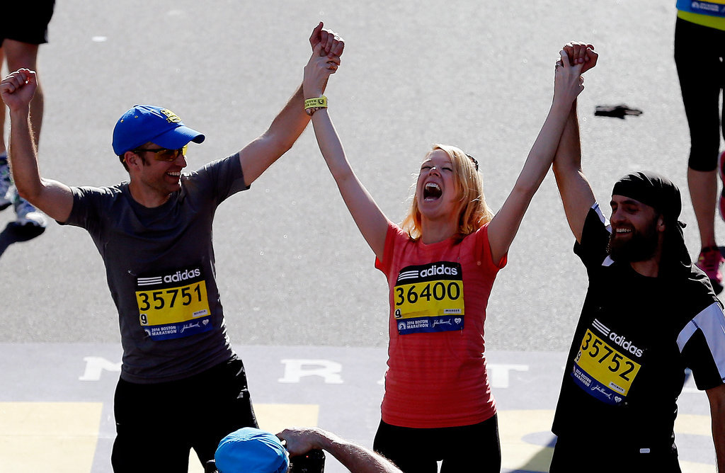 Boston Marathon bombing survivor Adrianne Haslet-Davis celebrated as she crossed the finish line one year later. Boston Marathon bombing survivor Adrianne Haslet-Davis celebrated as she crossed the finish line one year later.