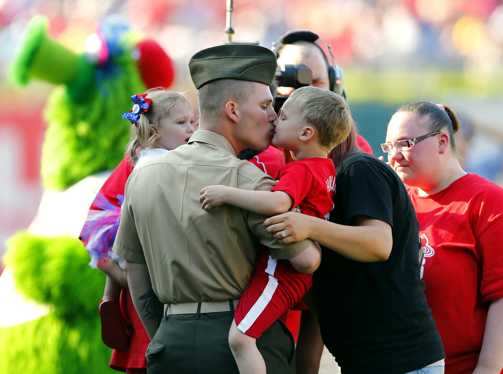 US Army Sgt. Joseph Heim kissed his 4-year-old son Ayden after surprising his family by returning home from a seven-month deployment at an MLB baseball game on June 1, 2013, in Philadelphia, PA.
US Army Sgt. Joseph Heim kissed his 4-year-old son Ayden after surprising his family by returning home from a seven-month deployment at an MLB baseball game on June 1, 2013, in Philadelphia, PA.