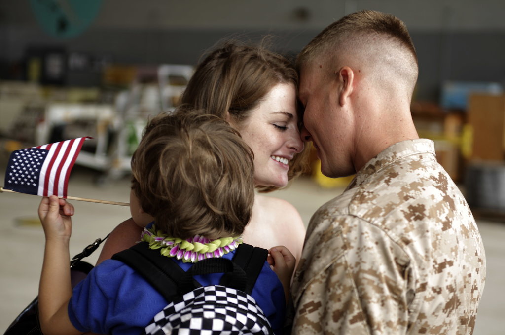 Savannah Dejong greeted her husband, Daniel, with 1/3 Marines Bravo Company upon his arrival home to Hawaii on June 13, 2010, following a seven-month deployment in southern Afghanistan.
Savannah Dejong greeted her husband, Daniel, with 1/3 Marines Bravo Company upon his arrival home to Hawaii on June 13, 2010, following a seven-month deployment in southern Afghanistan.
