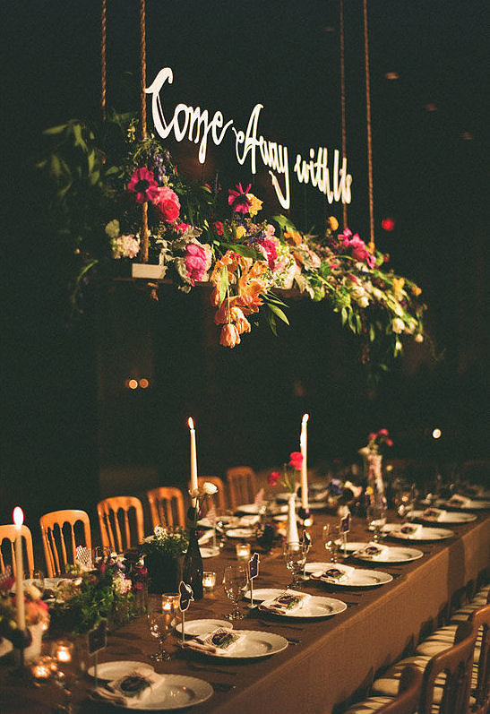 Hanging script above a lush flower box makes for an elegant, unique touch at the head table.
Photo by Tec Petaja via 100 Layer Cake
Hanging script above a lush flower box makes for an elegant, unique touch at the head table.
Photo by Tec Petaja via 100 Layer Cake