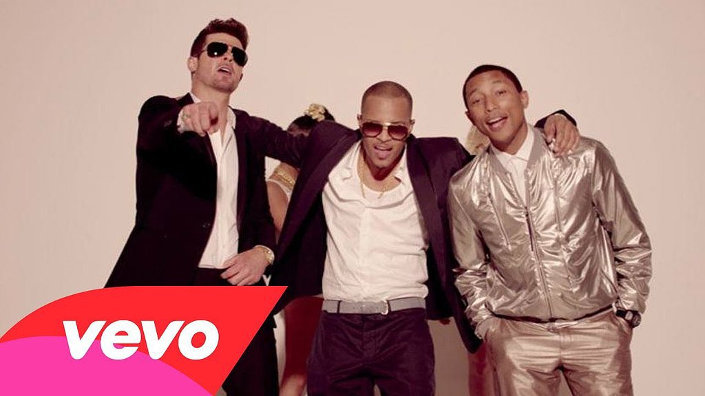 "Blurred Lines" by Robin Thicke featuring T.I. and Pharrell Williams "Blurred Lines" by Robin Thicke featuring T.I. and Pharrell Williams