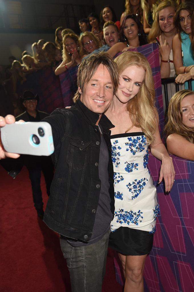 Nicole Kidman and Keith Urban snapped a picture on the red carpet at the CMT Music Awards in June 2014. Nicole Kidman and Keith Urban snapped a picture on the red carpet at the CMT Music Awards in June 2014.