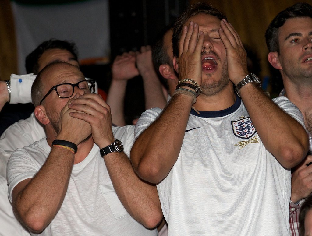 At a London pub, England fans looked worried during the team's game against Uruguay.
At a London pub, England fans looked worried during the team's game against Uruguay.