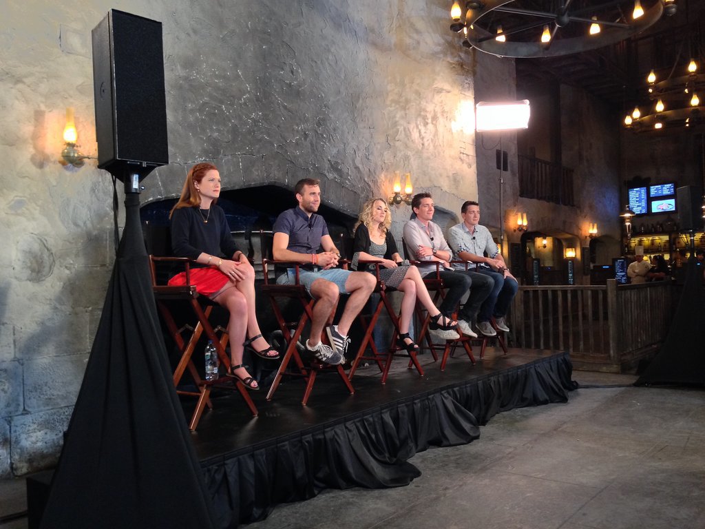 Bonnie Wright, Matt Lewis, Evanna Lynch, James Phelps, and Oliver Phelps sat together for a panel in The Leaky Cauldron restaurant.
Bonnie Wright, Matt Lewis, Evanna Lynch, James Phelps, and Oliver Phelps sat together for a panel in The Leaky Cauldron restaurant.