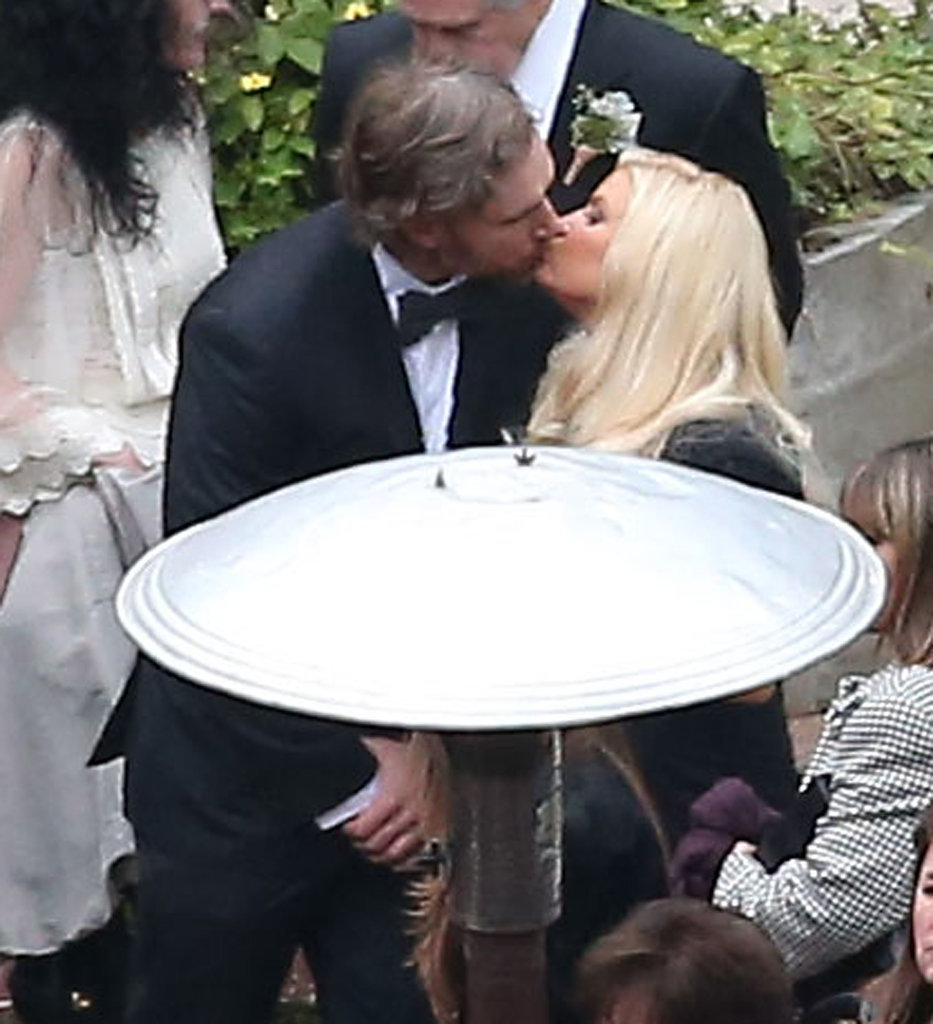 They shared a cute kiss at the December 2012 wedding of Jessica's best friend, CaCee Cobb, and actor Donald Faison in LA.
They shared a cute kiss at the December 2012 wedding of Jessica's best friend, CaCee Cobb, and actor Donald Faison in LA.