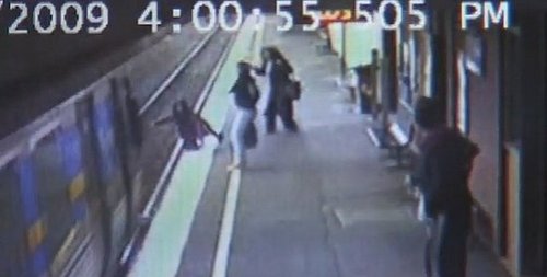Baby Falls Onto the Train Tracks and Survives
