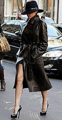 Photo of Victoria Beckham Wearing Black Leather Trench Coat in Paris Photo of Victoria Beckham Wearing Black Leather Trench Coat in Paris