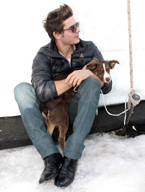 Photos of Zac Efron Playing With Dogs in Aspen Photos of Zac Efron Playing With Dogs in Aspen