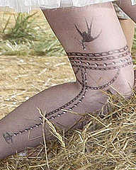 Chanel Thigh Tattoo