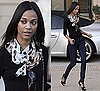 Photos of Zoe Saldana Shopping in Beverly Hills Wearing Black Shirt, Blue Jeans, and Chanel Bag