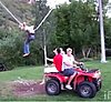 Girl in a Human Slingshot