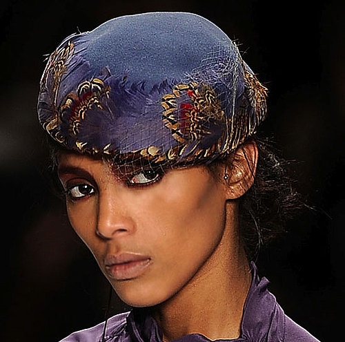 The Asymmetrical Button Cap The Asymmetrical Button Cap