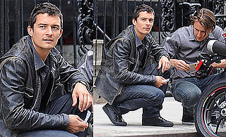 Photos of Orlando Bloom Fixing His Motorcycle in NYC