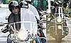 Photos of Elisabetta Canalis And George Clooney Riding a Motorcycle in Italy With Rande Gerber