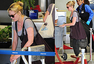 Photos of Kirsten Dunst at LAX 2009-08-23 06:00:00