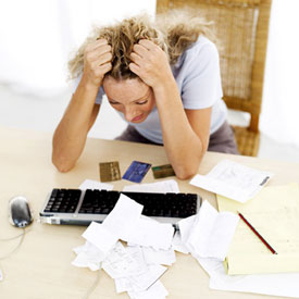 How much does the average American household have in credit card debt?