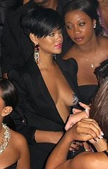 Rihanna Wears Star-Shaped Pasties and Black Blazer at Fourth of July Party Rihanna Wears Star-Shaped Pasties and Black Blazer at Fourth of July Party