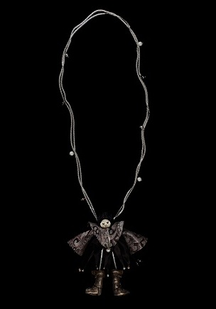 MinaPoe Evil Guest Doll Pendant: Love It or Hate It?