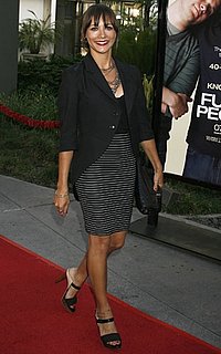 Actress Rashida Jones in Black Blazer and Striped Skirt at Funny People Premiere