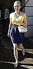 Actress Diane Kruger Shopping in Berlin in Blue Print Tulip Skirt, Yellow Top, and Chanel Bag