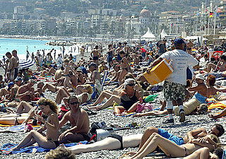 Front Page: France Says Au Revoir to Topless Sunbathing