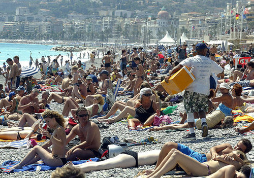 Front Page: France Says Au Revoir to Topless Sunbathing