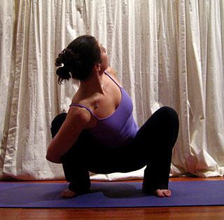 Half Bound Wide Squat Yoga Pose