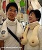Mother and Son Wear Boob-Themed Scarves