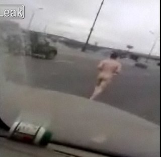 Naked Man Runs in Traffic