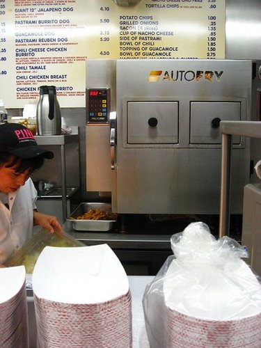 Their fries come out of the "Auto Fry" machine. She put them in the door and they came out of the hatch at the bottom. Also, see that Pastrami Reuben Dog? Why didn't I order that?!
Their fries come out of the "Auto Fry" machine. She put them in the door and they came out of the hatch at the bottom. Also, see that Pastrami Reuben Dog? Why didn't I order that?!