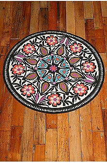 UrbanOutfitters.com > 30 Inch Round Printed Rug ($14)