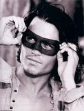 Does Johnny Depp Look Like Orlando Bloom in this picture?