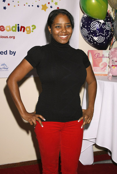 Shar Jackson had her mini–me in tote with her to read to the kids. Shar Jackson had her mini–me in tote with her to read to the kids.