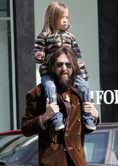 Shoulder rides going strong for Ryder Robinson and rocker dad Chris Robinson. Shoulder rides going strong for Ryder Robinson and rocker dad Chris Robinson.