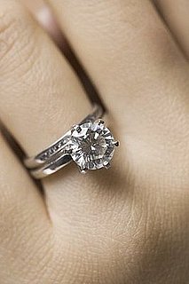 Do Tell: Is It Bad Luck to Try on Someone's Ring?